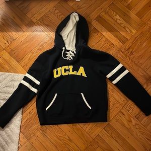 Navy blue UCLA hoodie with yellow lettering size M